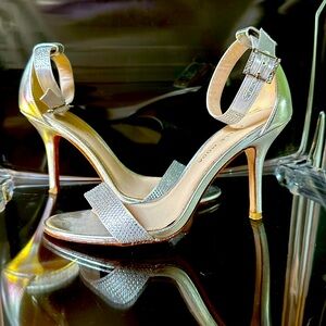 Women’s Silver High Heel sandal. Size 6.5 
Perfect Party Shoes!